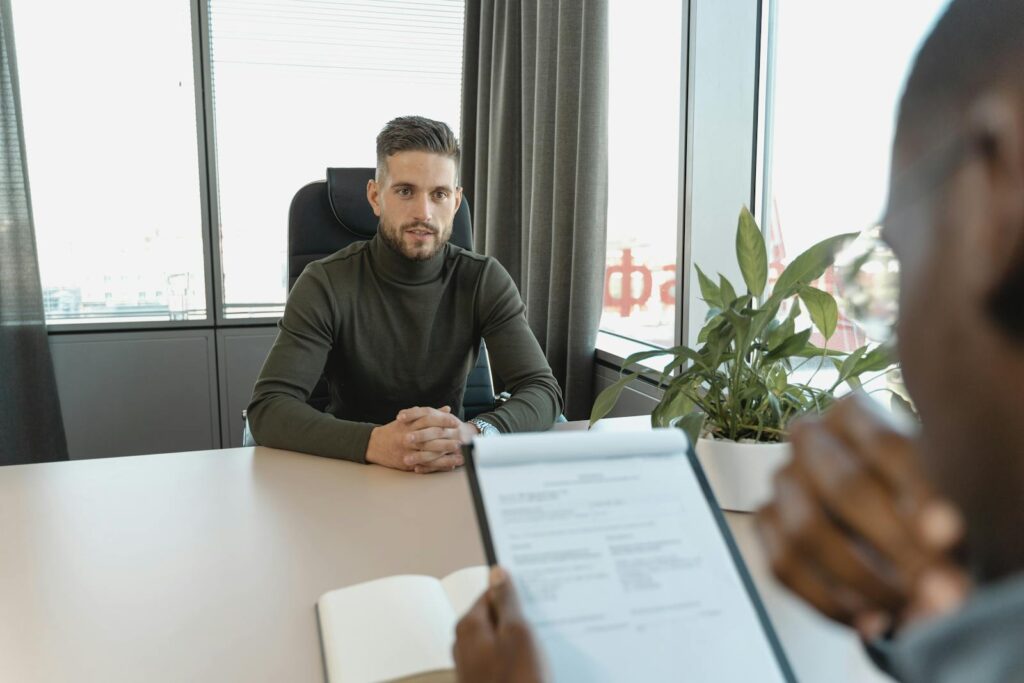 A man interviewing for his dream job after building his personal brand